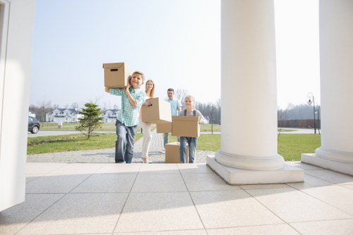 Professional movers handling furniture