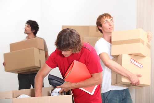 Trucks transporting office furniture and equipment