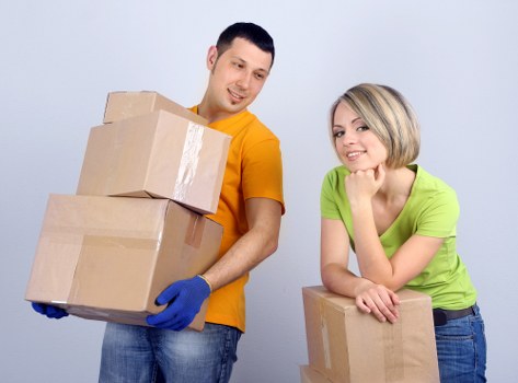 Professional moving team assisting with a move
